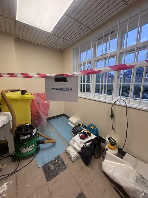 Asbestos floor tile and bitumen removal in Crouch End
